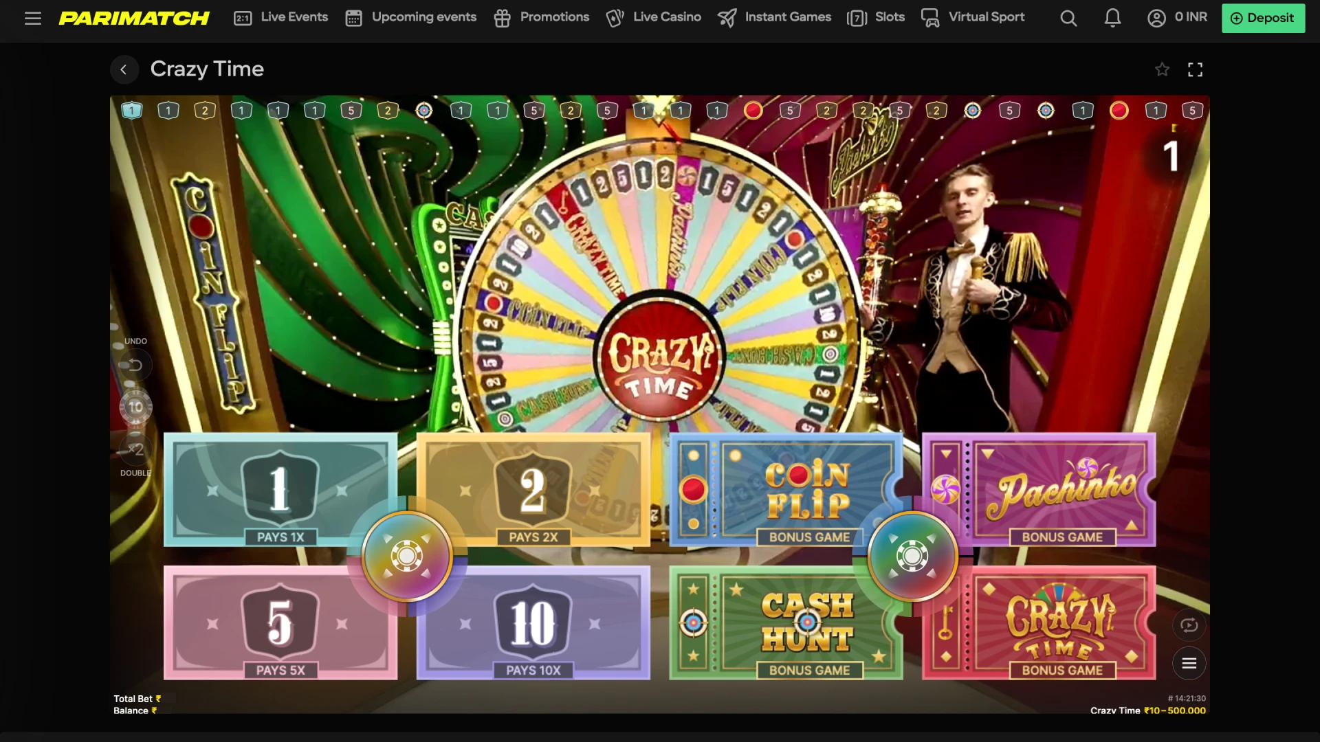 The Top Slot spins above the main wheel to add random multipliers to specific segments in Crazy Time.